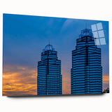 Large abstract wall art of the Atlanta skyline in muted colors on acrylic glass, ideal for bedroom or dining room decor.