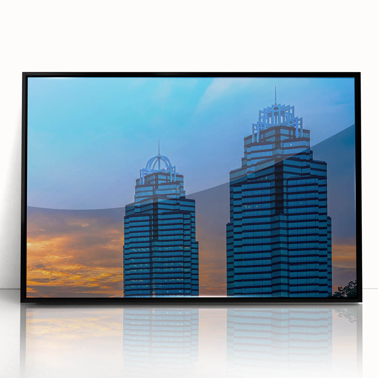 Large abstract wall art depicting the Atlanta skyline in muted gray and blue tones on a framed acrylic panel.