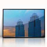 Large abstract wall art depicting the Atlanta skyline in muted gray and blue tones on a framed acrylic panel.