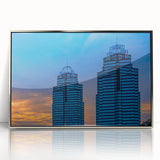 Mid-century modernist art of Atlanta skyline in silver acrylic frame, using a palette of cool blues and grays.