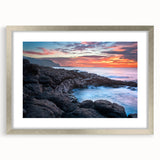 Textured abstract art print of Kauai, Hawaii, in muted green and blue tones, framed in silver, suitable for bedroom decor.