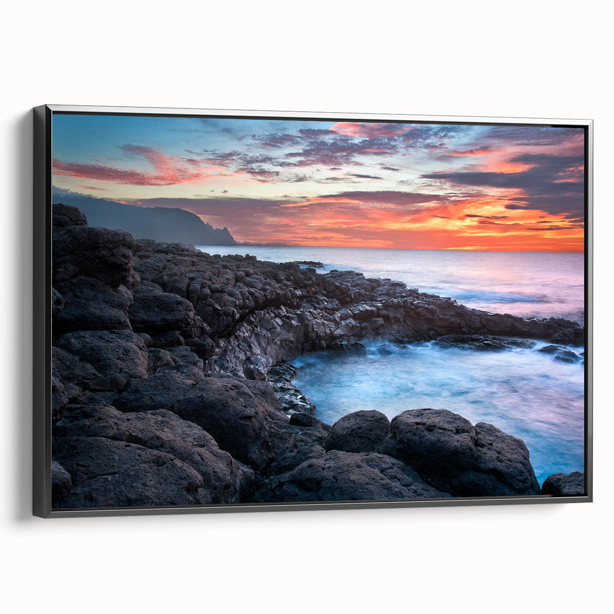 Black and white framed canvas of Kauai landscape, vintage poster style, ideal for bedroom ambiance.