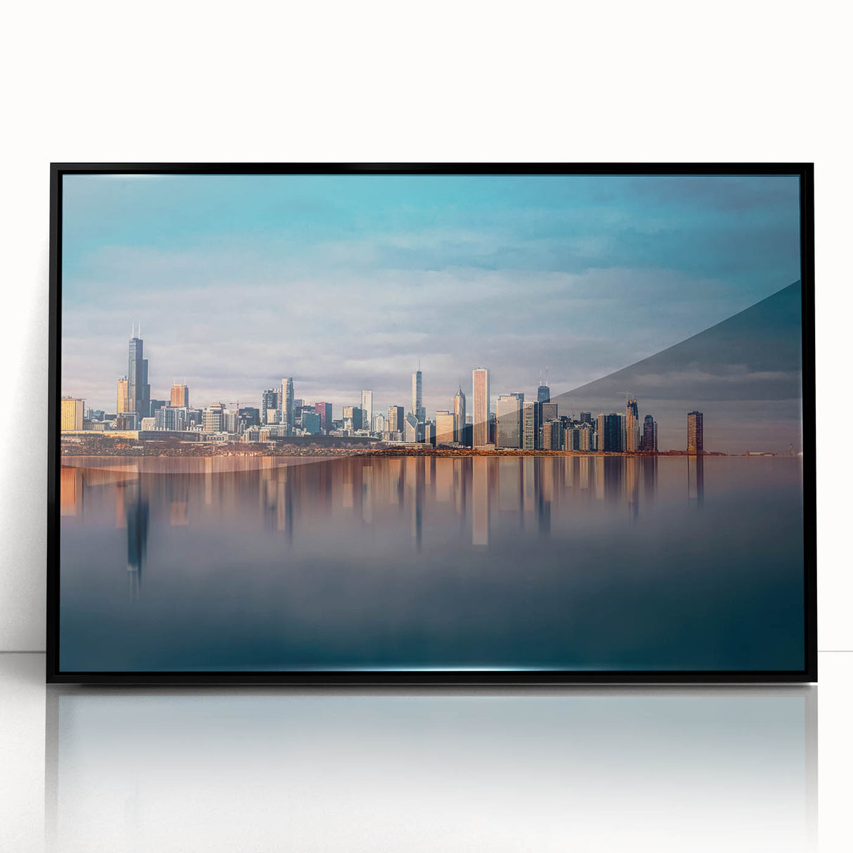 Large abstract wall art depicting the Chicago skyline in muted black and white tones, framed in black acrylic.