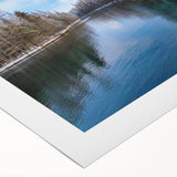 Art deco poster of Lake Michigan, featuring muted blue and gray tones on rolled canvas, suitable for dining room wall art.