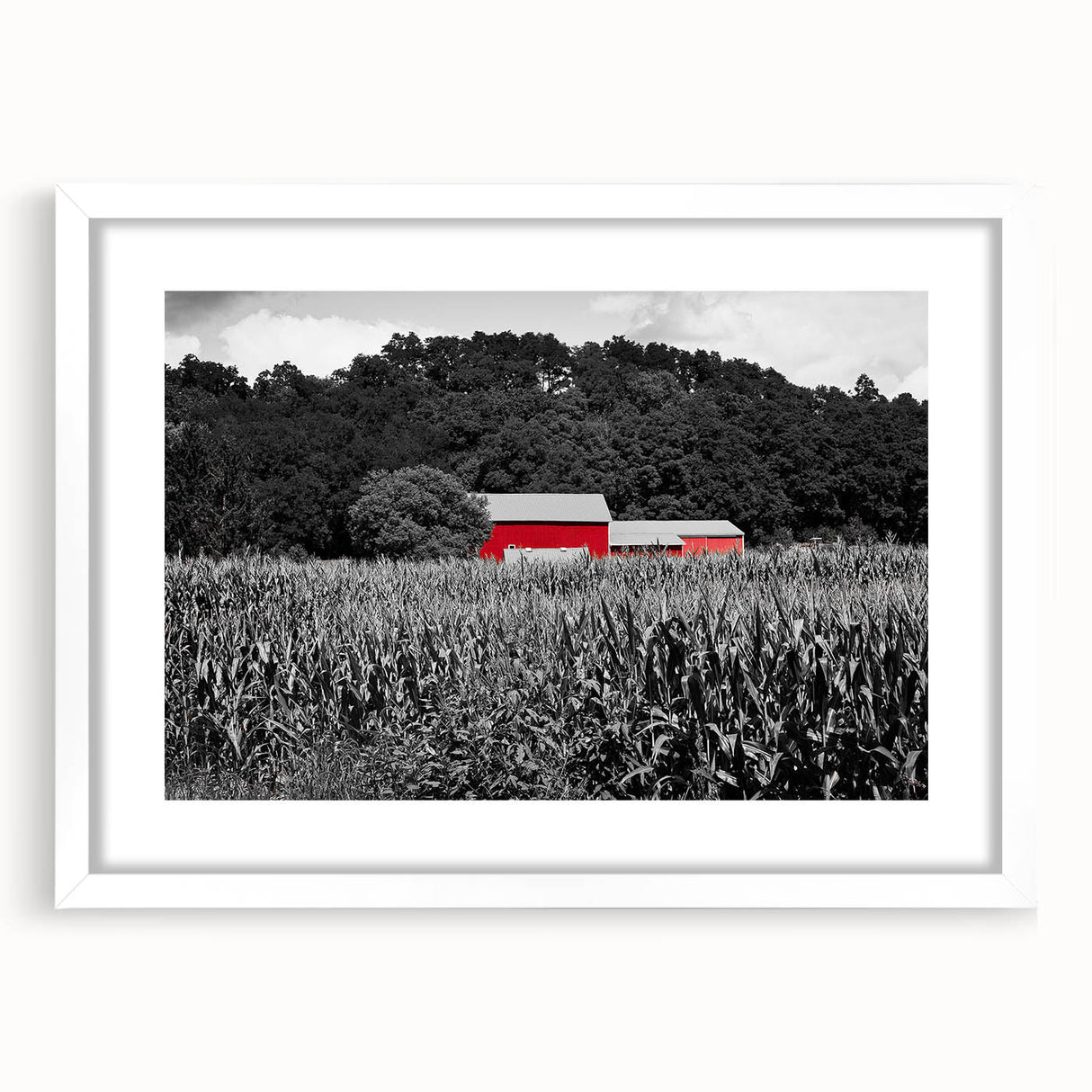 Abstract art print of Iowa scenery in muted greens and blues, framed with a white mat, suitable for dining room decor.