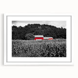 Abstract art print of Iowa scenery in muted greens and blues, framed with a white mat, suitable for dining room decor.