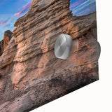 Large abstract wall art featuring swirling patterns in earthy tones on acrylic glass, ideal for dining room ambiance.