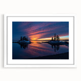 Abstract art print of a serene Maine landscape in muted blue and green hues on a white-framed canvas.