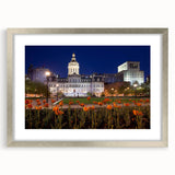 Textured art print of abstract Baltimore scenery in muted earth tones, framed in silver, ideal for bedroom decor.