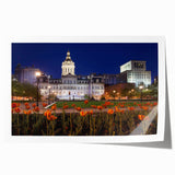 Rolled print of Baltimore scenery in soft pastel shades, featuring floral elements.