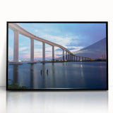 Large abstract wall art depicting the Chesapeake Bay in muted blues and greens, framed in black acrylic.