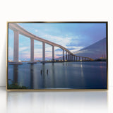 Acrylic print of Chesapeake Bay with soft gold and blue tones, framed in gold, suitable for modern art wall decor.