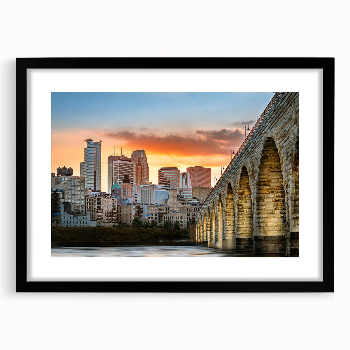 Abstract art print of Minneapolis skyline in colorful, textured strokes on a large framed canvas.