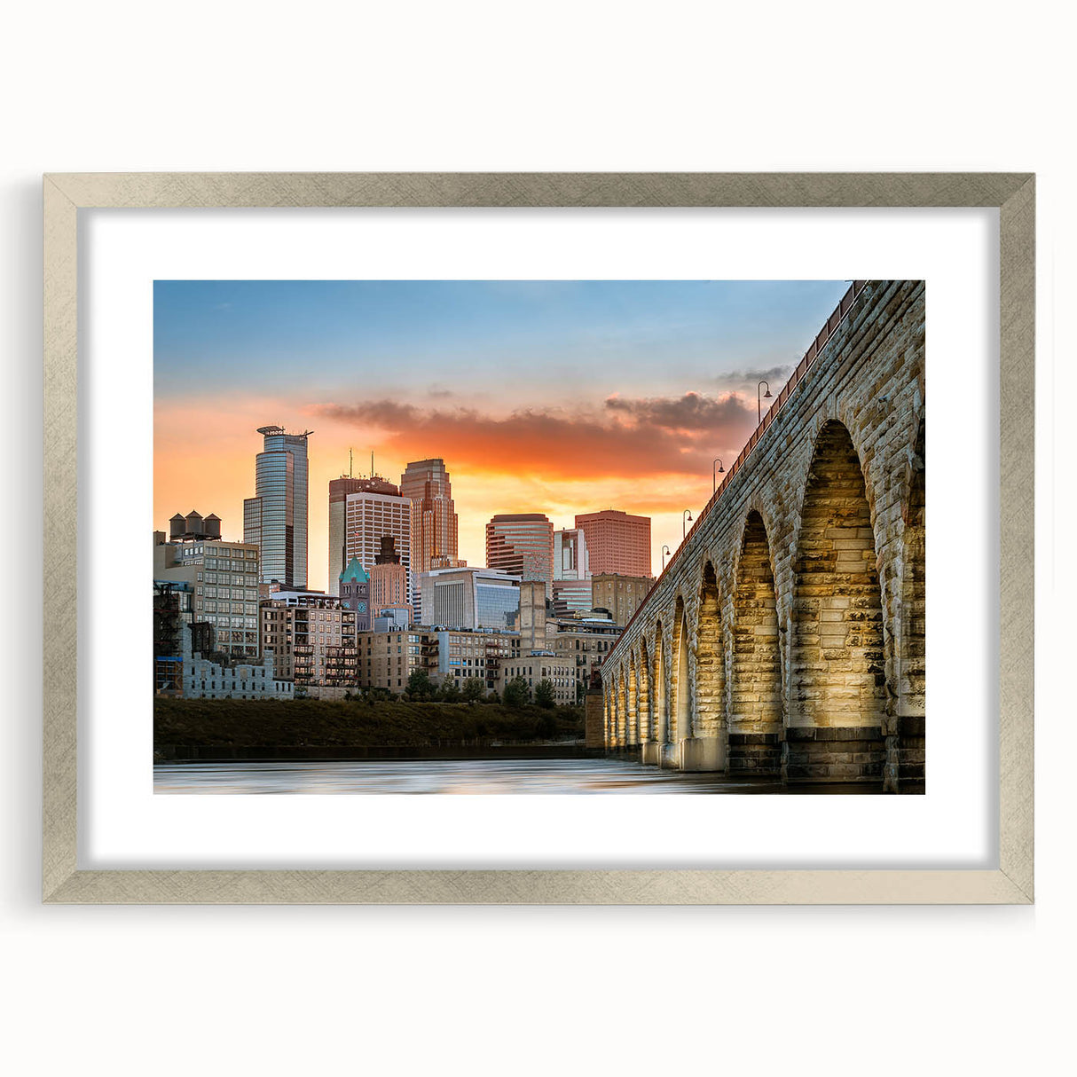 Textured abstract art print of Minneapolis skyline in muted blue and gray tones on framed canvas, suitable for bedroom decor.