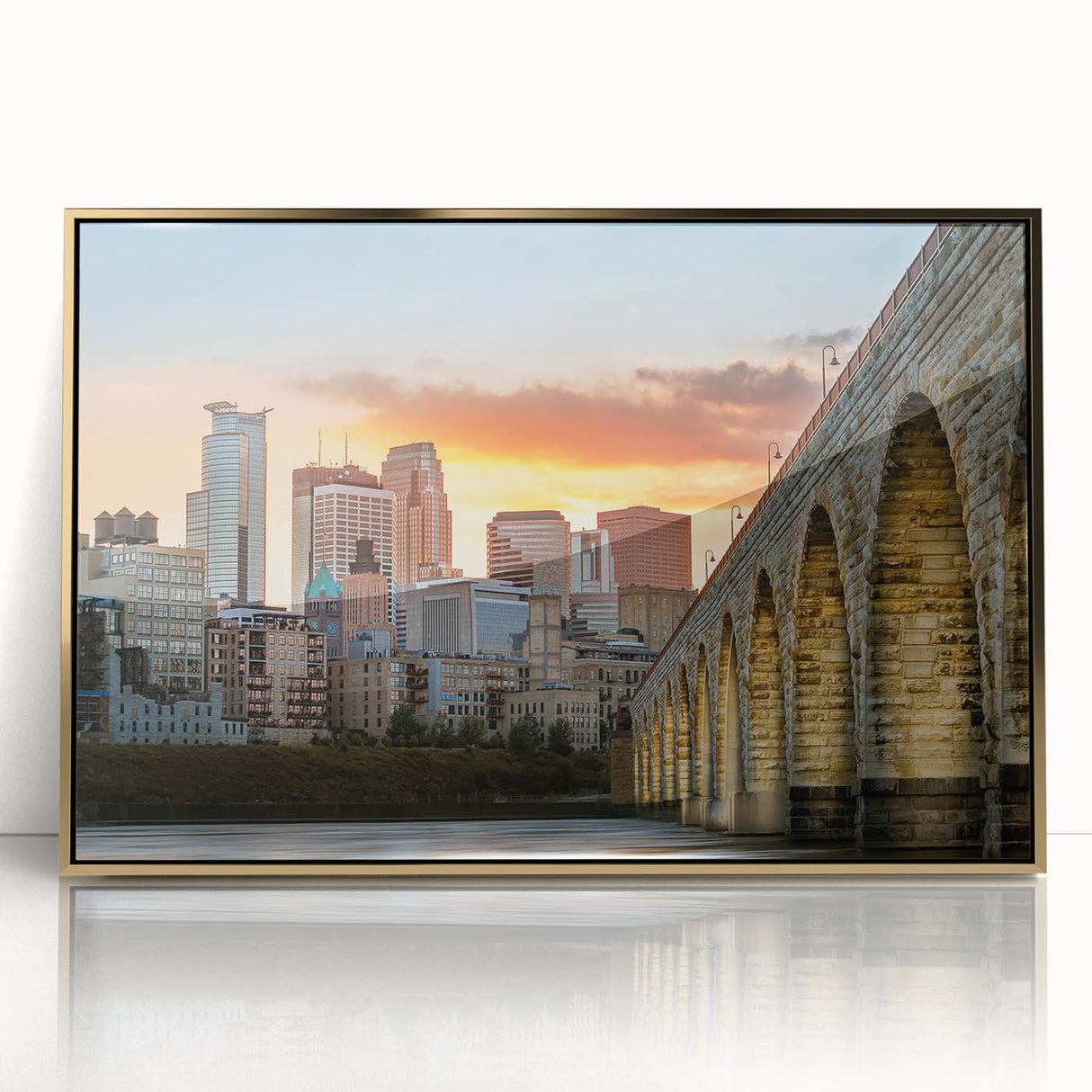 Acrylic framed print of Minneapolis skyline in muted gold and blue tones, suitable for modern art wall decor.