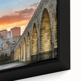 Extra large framed canvas featuring a textured depiction of the Minneapolis skyline in black and colorful art.