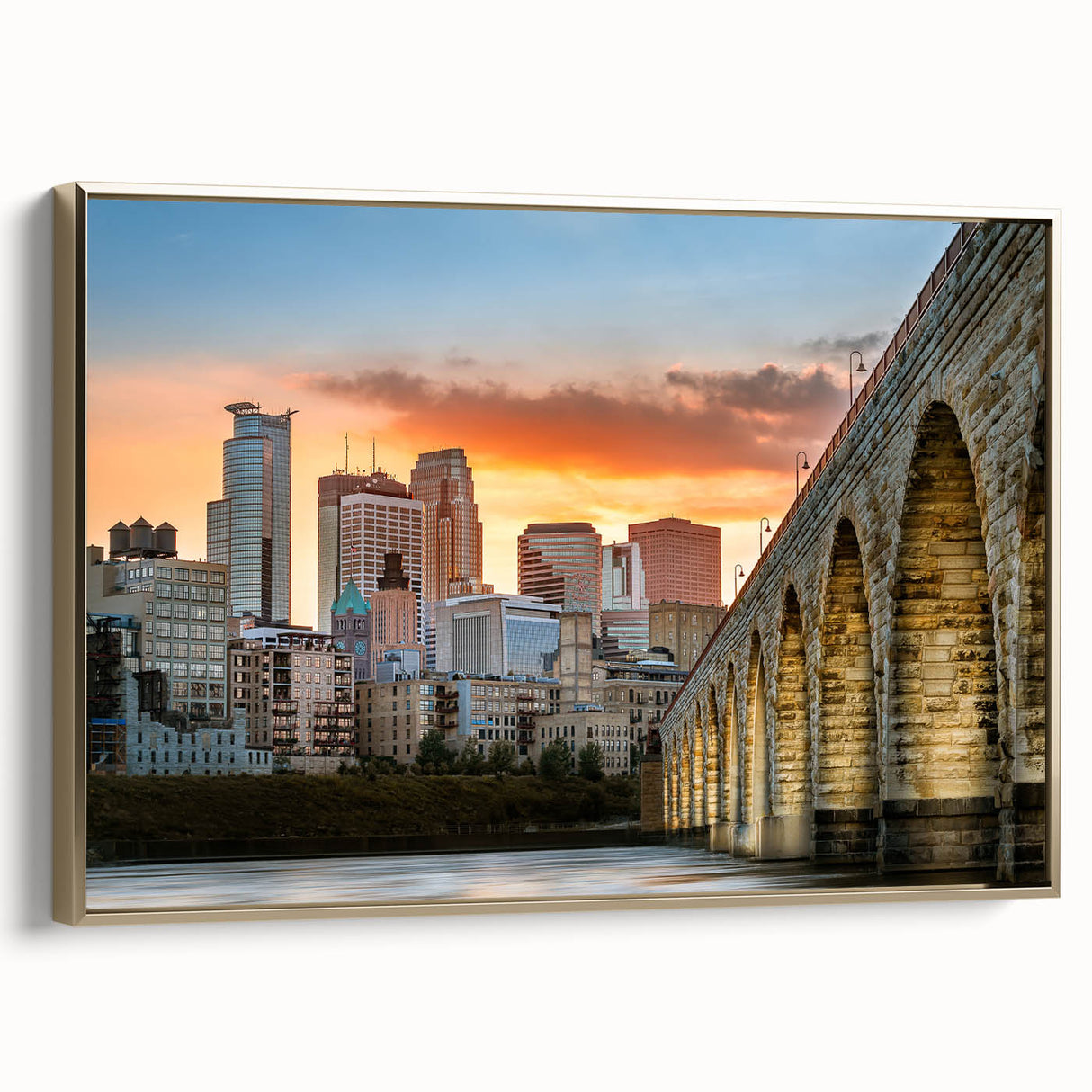 Framed canvas featuring a vintage-style landscape painting of Minneapolis, with muted gold and black tones.