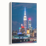 Vintage poster art of Kansas City skyline on a large framed canvas with colorful and black elements.