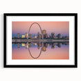 Abstract art print of St. Louis skyline in vibrant colors on a large textured canvas, ideal for living room decor.