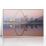 Framed acrylic print of St. Louis skyline in art deco style with pastel shades, ideal for modern nursery wall art.