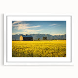 Abstract art print of Montana scenery in muted earth tones on a framed canvas, ideal for dining room decor.
