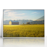 Acrylic print of Montana scenery in muted earth tones, framed in white, suitable for modern nursery decor.
