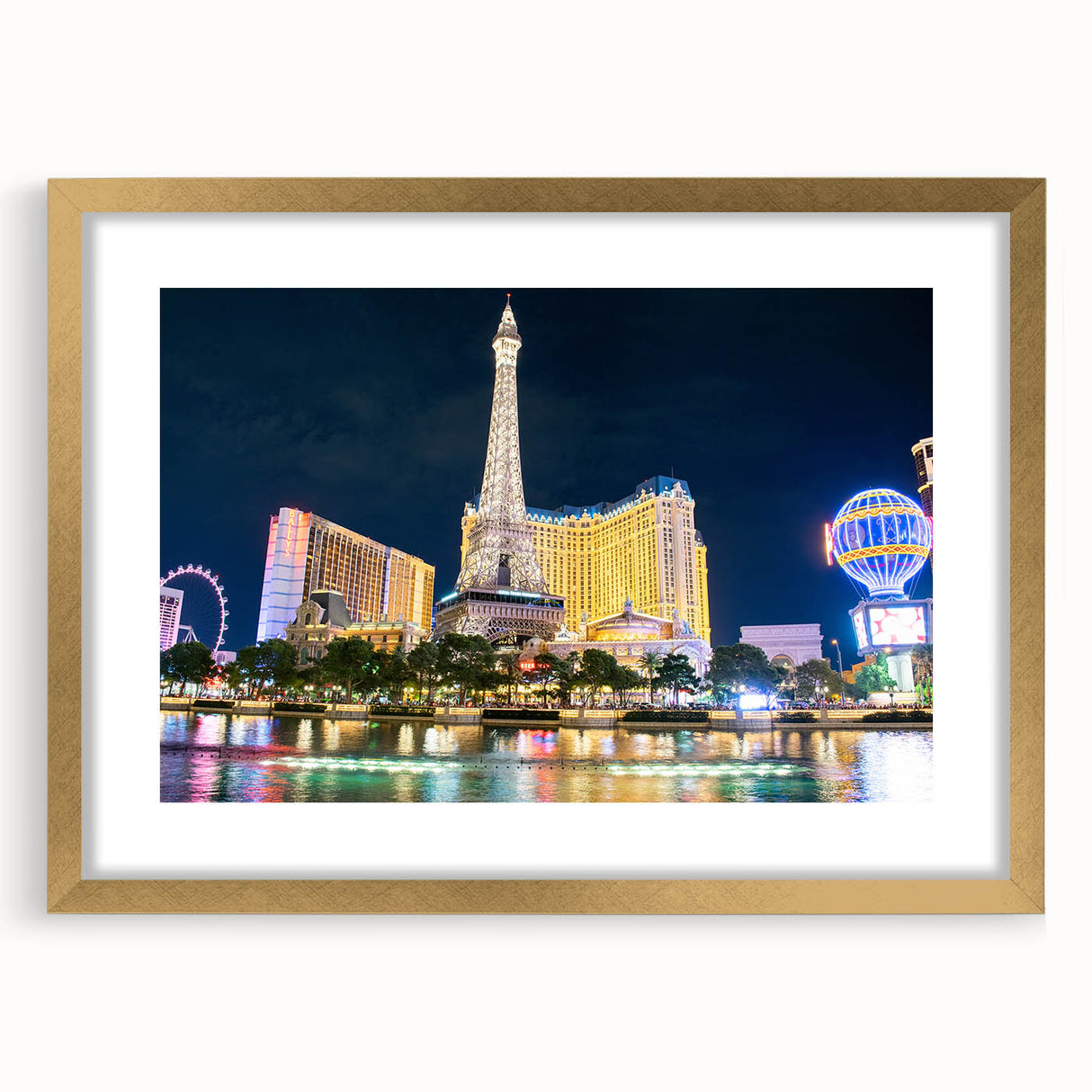 Extra large wall art of abstract Las Vegas scenery in textured gold frame, ideal for living room decor.