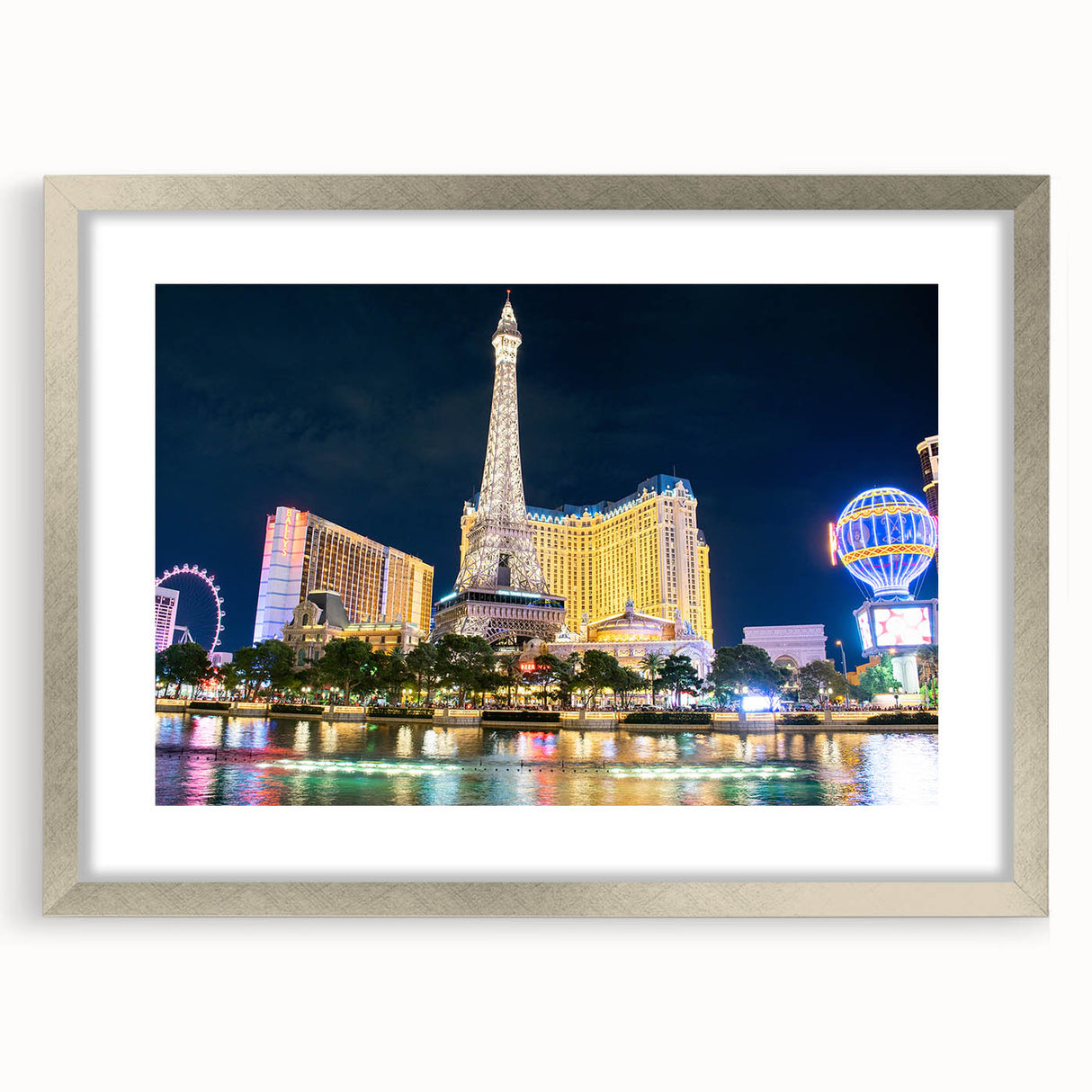 Textured abstract art print of Las Vegas skyline in muted silver and gray tones on a framed canvas.