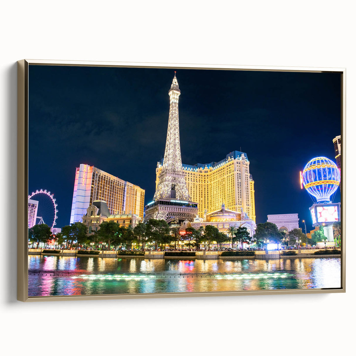 Framed canvas wall art featuring a vintage-style Las Vegas landscape in black and gold tones, ideal for bedroom decor.