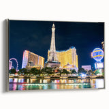 Framed canvas landscape art painting of Las Vegas with colorful accents on black, ideal for modern living room decor.