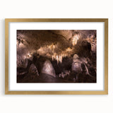 Extra large abstract art print featuring textured scenery of New Mexico in muted earth tones, framed in gold.