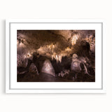 Abstract art print depicting the New Mexico landscape in muted earth tones on a framed white mat.