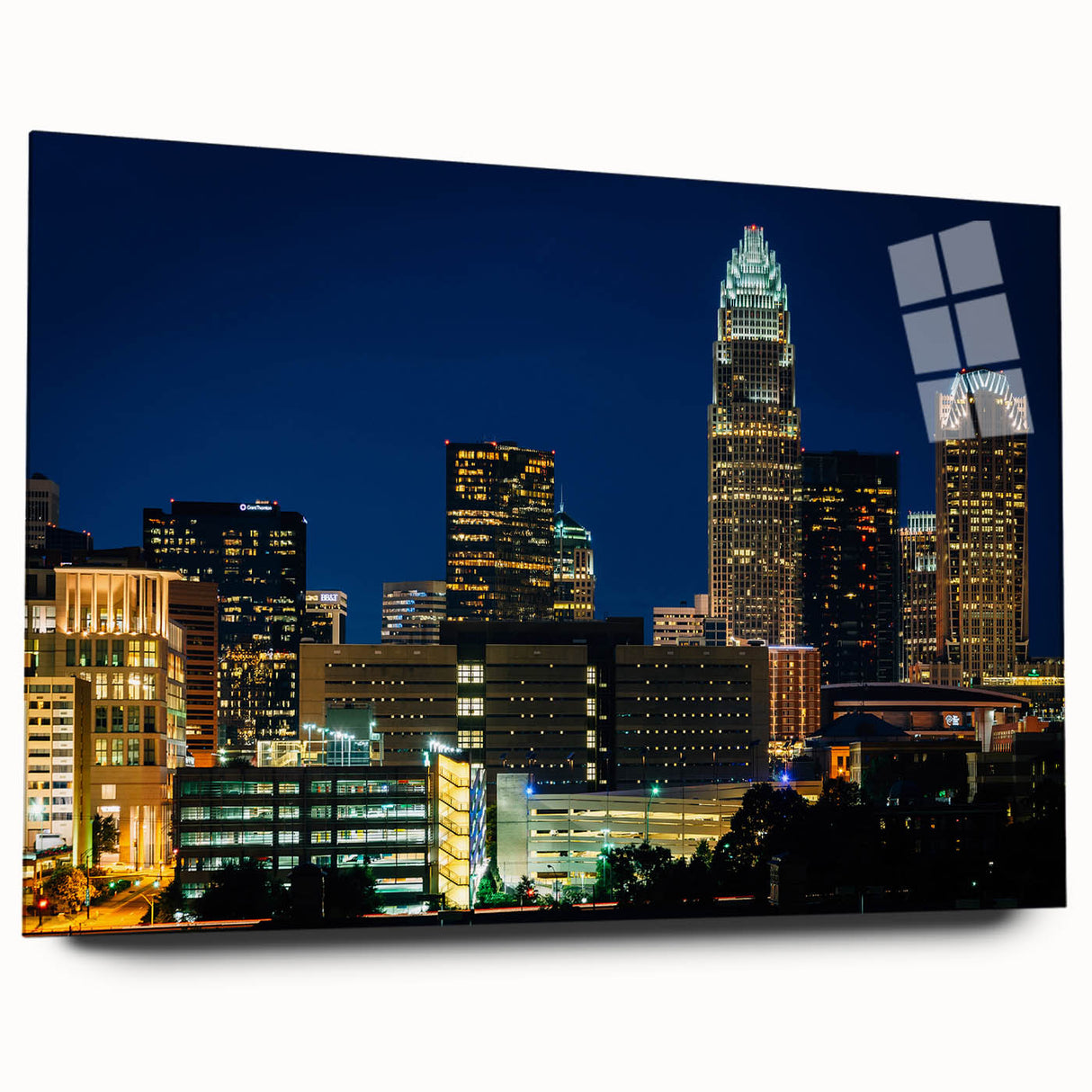 Acrylic print of a large abstract depiction of Charlotte's skyline in muted gray and blue tones.