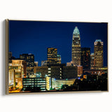Framed canvas wall art featuring a vintage-style landscape of Charlotte, North Carolina in black and gold tones.