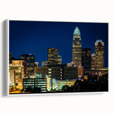 Vintage poster art of Charlotte skyline in colorful hues on a large framed canvas, ideal for living room decor.