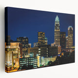 Charlotte skyline in muted gray and blue tones on a large stretched canvas, suitable for kitchen wall art.