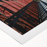 Art deco poster of Durham, North Carolina skyline in muted gray and blue tones on rolled canvas.