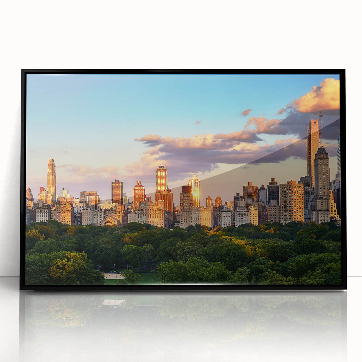 Large abstract wall art of Central Park in muted green and brown tones, framed in black acrylic.