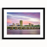 Abstract art print featuring textured, colorful swirls on a large black-framed canvas, ideal for living room decor.