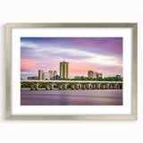 Textured abstract art print depicting Oklahoma scenery in muted earth tones, framed in silver, ideal for bedroom wall decor.