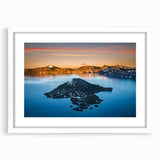 Abstract art print of Crater Lake in muted blue and green tones on a white framed mat.