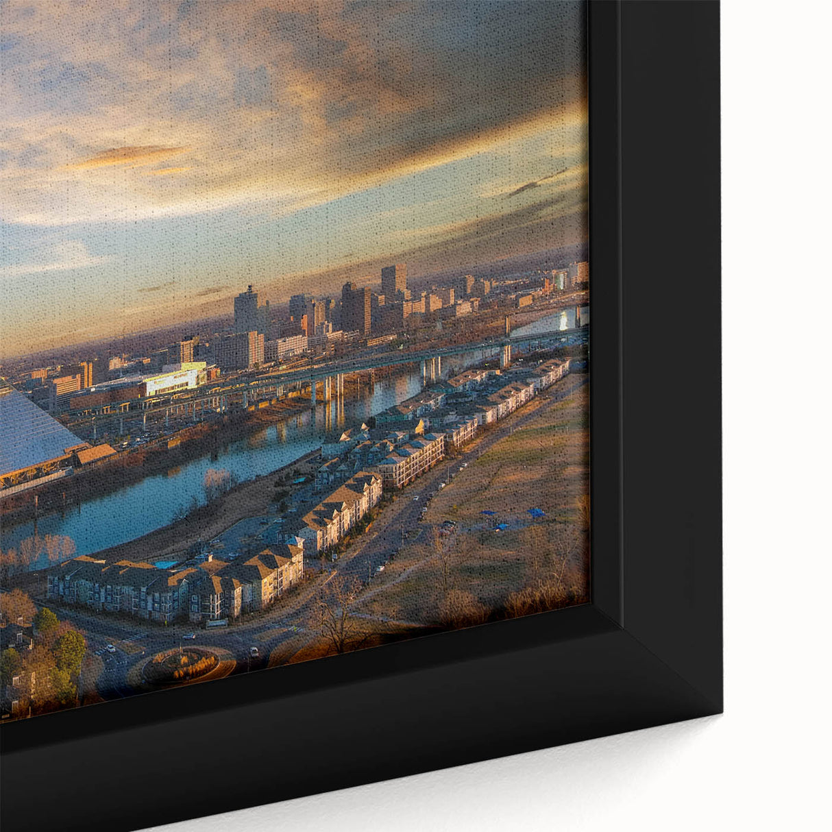 Close-up of a textured black wall art depicting vibrant Memphis scenery on a framed canvas, ideal for living room decor.