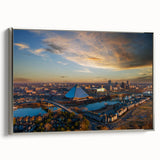 Framed canvas of a colorful Memphis landscape with vintage poster art style, ideal for adding character to a living room.