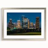 Textured art print of abstract Houston skyline in muted gray and silver tones, framed with a silver mat.
