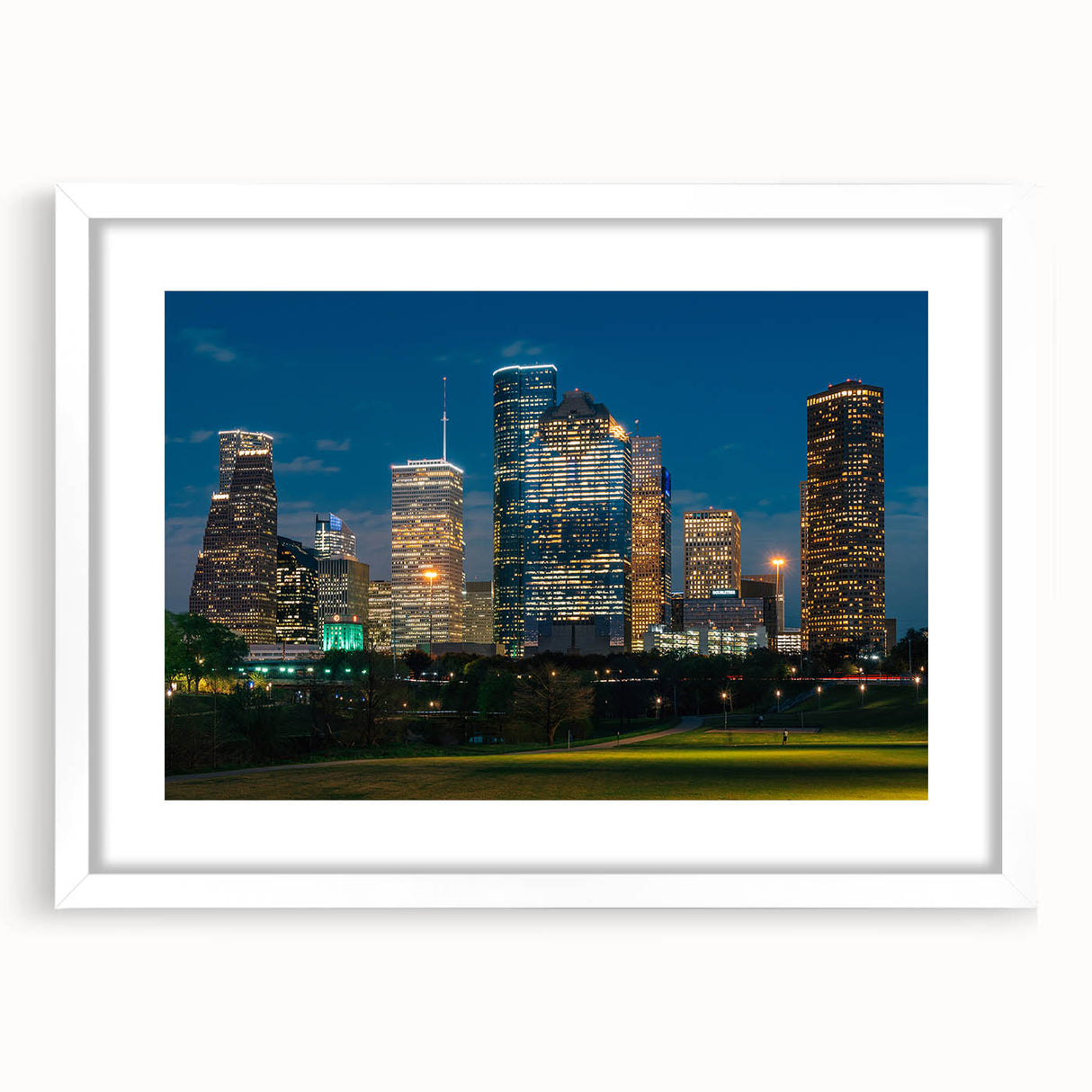 Abstract art print of Houston skyline in muted blue and gray tones, framed with a white mat, suitable for dining room decor.