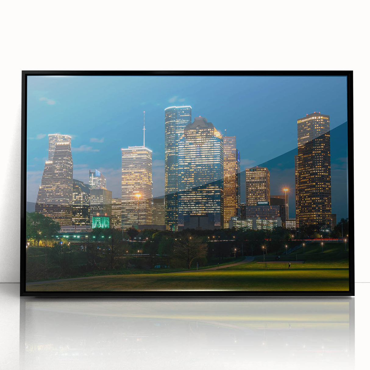 Large abstract wall art depicting the Houston skyline in muted gray and blue tones on a black framed acrylic.