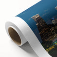 Art Deco style poster of Houston skyline in pastel colors on rolled canvas.