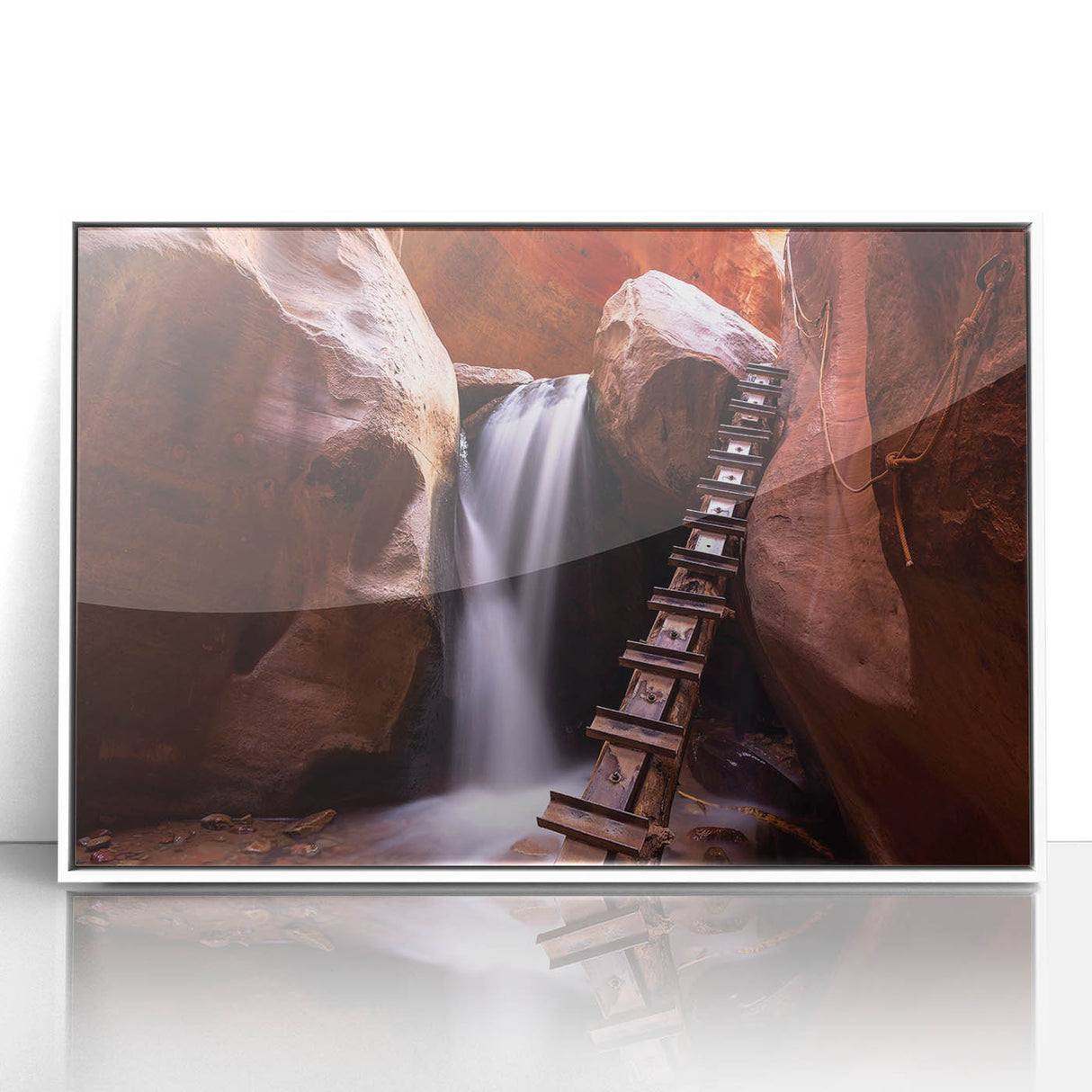 Acrylic print of Zion National Park in muted earth tones, framed in white, suitable for modern art wall decor.