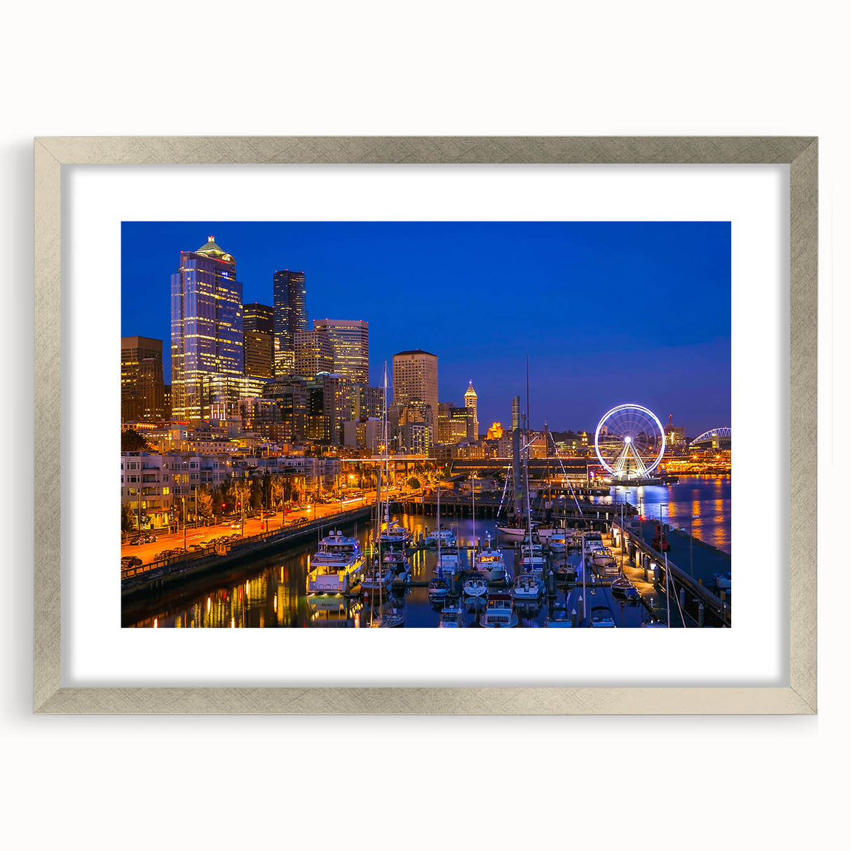 Textured art depicting an abstract Seattle skyline in muted gray and blue tones on a framed silver mat.