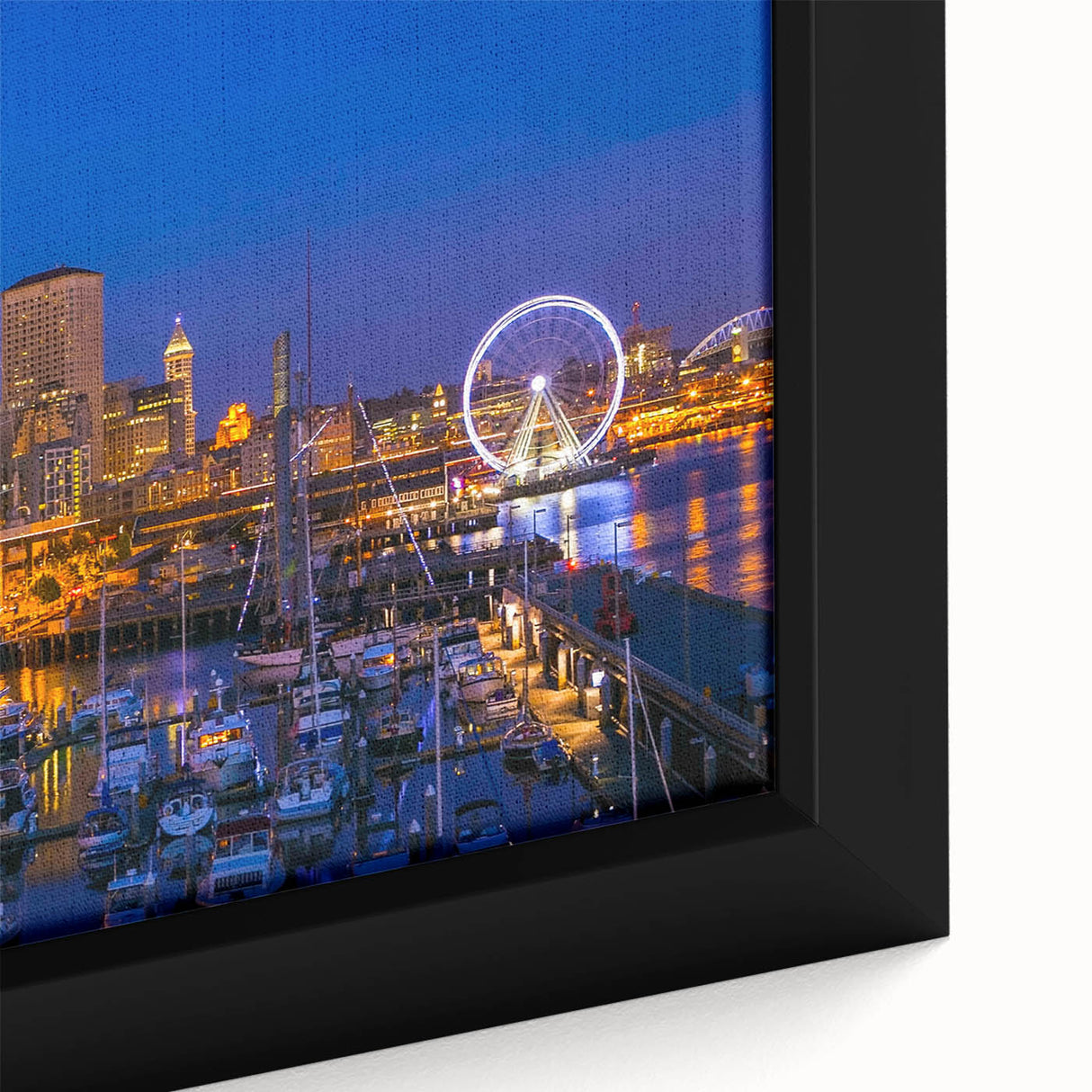 Framed canvas featuring a black textured depiction of the Seattle skyline with colorful art accents.
